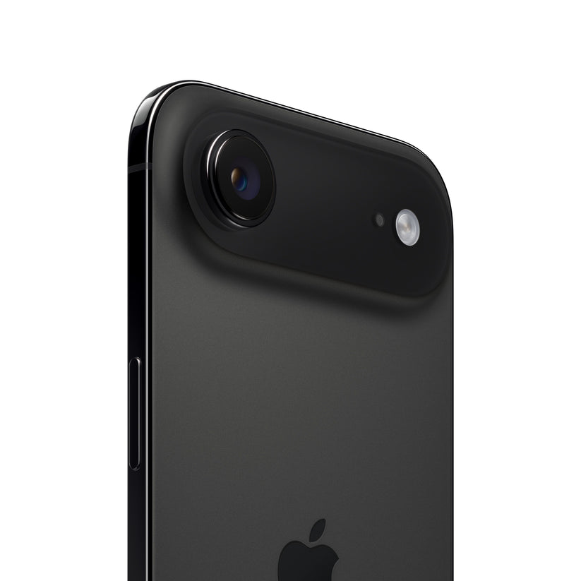 A close-up view of the dark iPhone Air, highlighting the upper-rear horizontal camera plateau housing the single protruding camera lens, microphone hole, and flash, along with the dark metal frame, side button, and the top portion of the Apple logo.