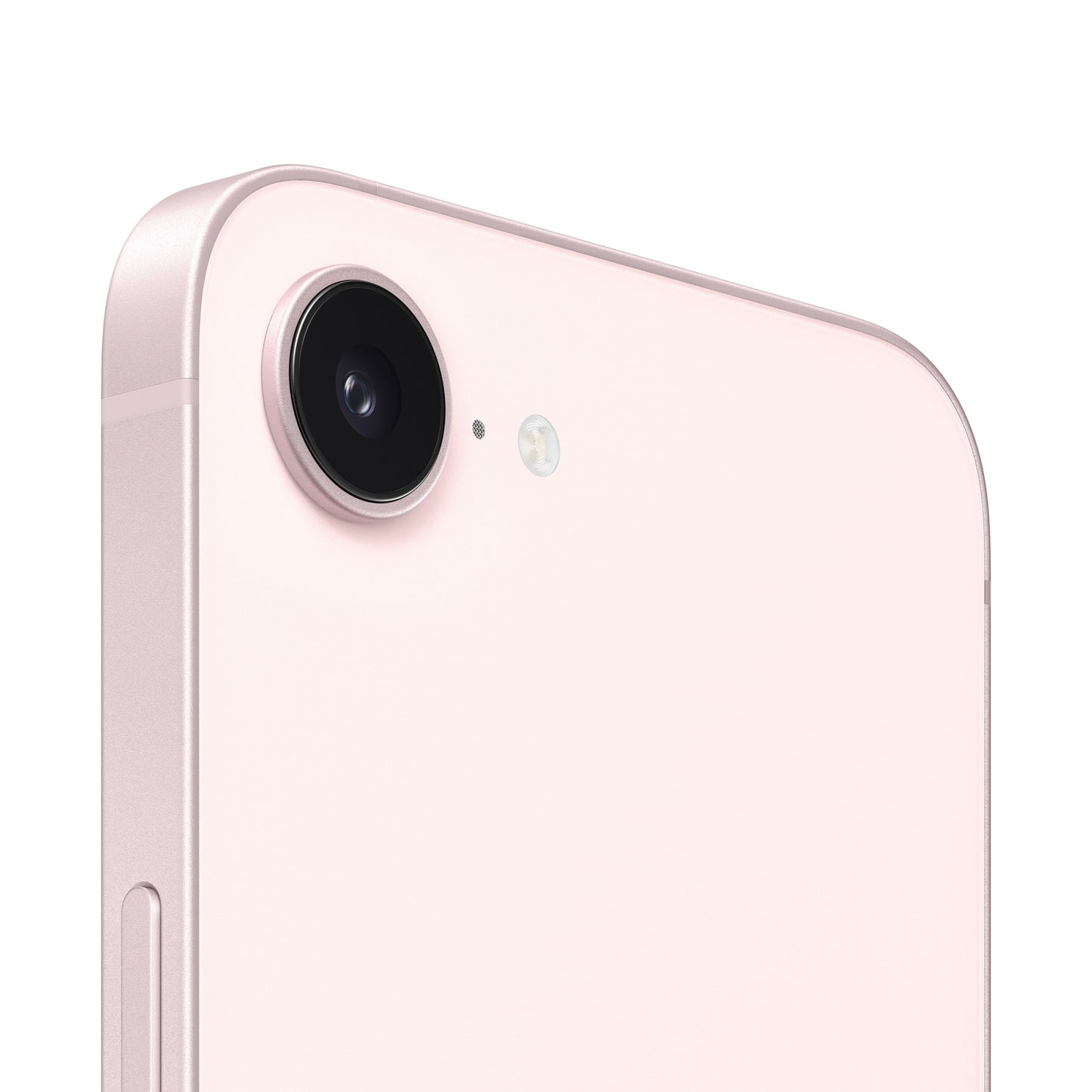 A close-up view of the pink smartphone's rear camera module, highlighting the single protruding lens, a tiny microphone hole, and the adjacent circular flash ring