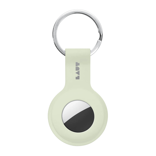 Front view in daylight of the unique LAUT HUEX TAG case for AirTag in Glow in The Dark available at Tradeline.